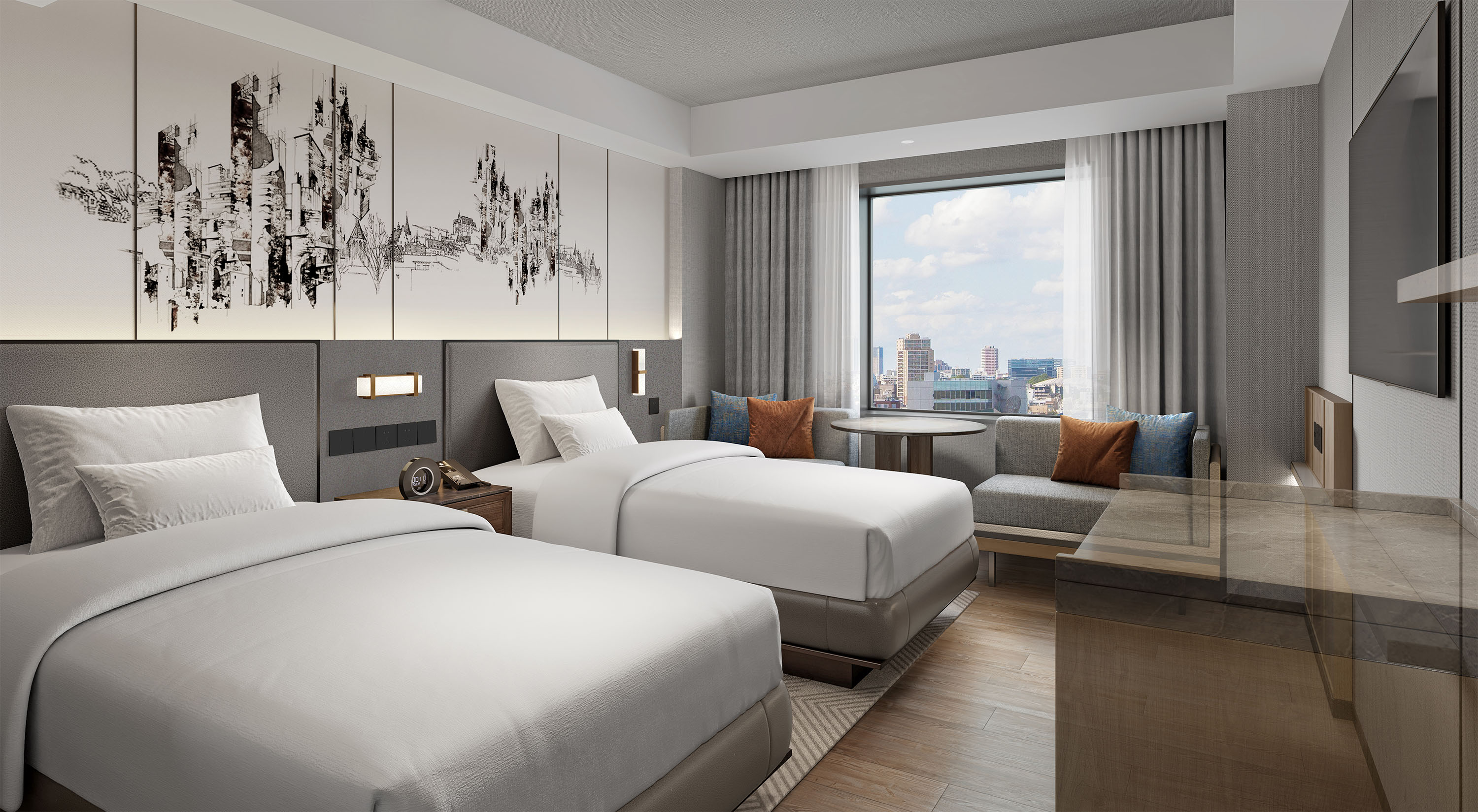 The renovated twin room at Hotel Crown Palais Kokura, featuring a white-based interior and two beds, each 110 cm wide.